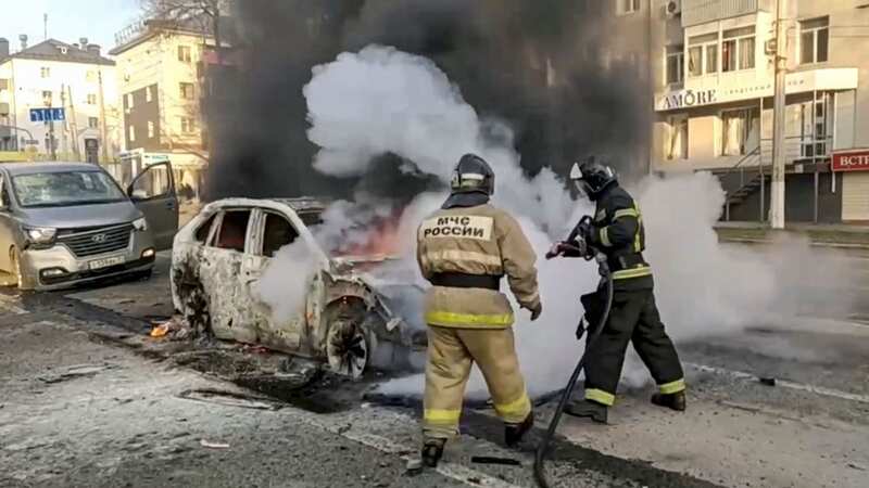 Russian firefighters putting out the fire after shelling in Belgorod (Image: RUSSIAN EMERGENCIES MINISTRY HANDOUT/EPA-EFE/REX/Shutterstock)