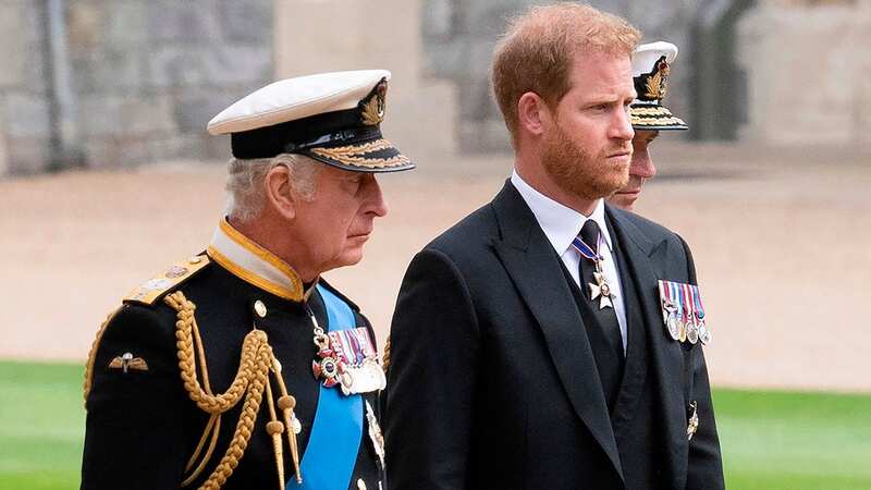 King Charles with his estranged son Prince Harry (Image: Getty Images)