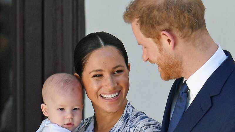 Duke and Duchess of Sussex holding their son Archie (Image: PA)