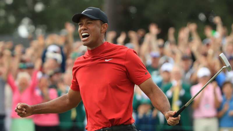 Tiger Woods wore an iconic "Sunday Red" Nike shirt as he won The Masters in 2019. (Image: Andrew Redington/Getty Images)