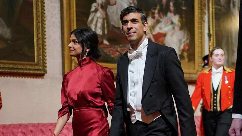 Rishi Sunak with wife Akshata Murty, whose shares in childcare firm Koru Kids caused him a headache (Image: POOL/AFP via Getty Images)