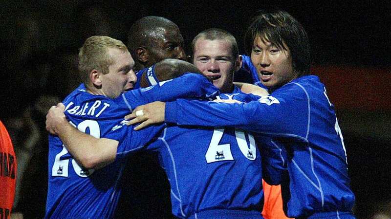 Li Tie joins Everton team-mates in celebration during a 2002 win at West Ham (Image: PA)