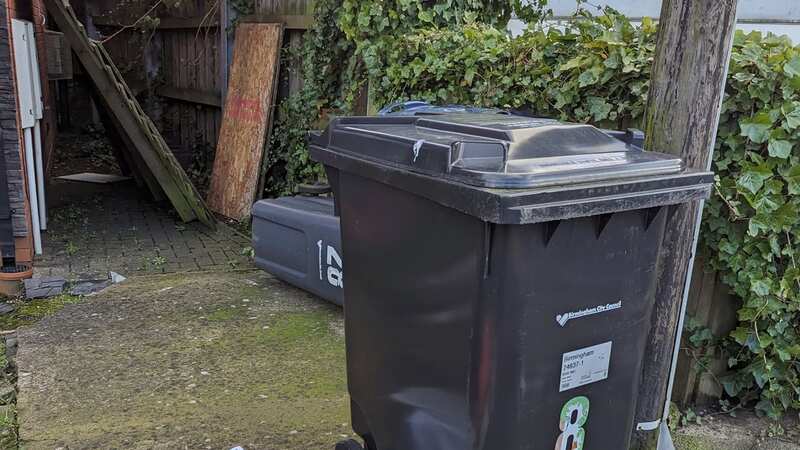 The bin where the abandoned bull breed dog was found (Image: RSPCA / SWNS)