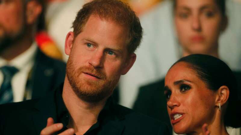 Prince Harry and Meghan Markle (Image: AFP via Getty Images)