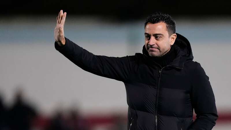 Xavi held his hands up after Barcelona