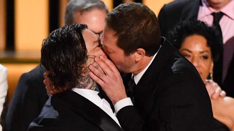 Ebon Moss-Bachrach kisses Canadian chef and actor Matty Matheson