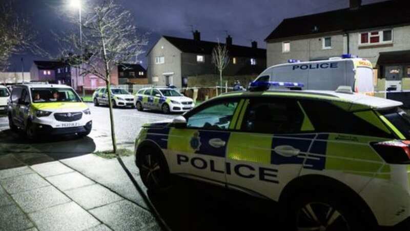 Police cordoned off houses in Kirkby, Merseyside (Image: Liverpool Echo)