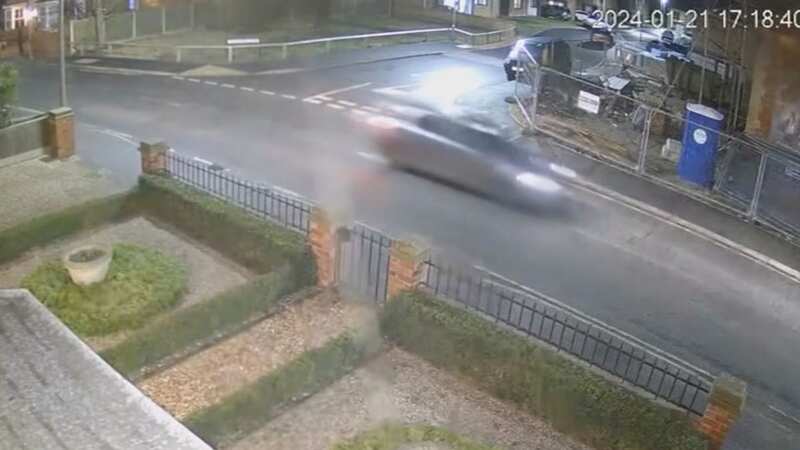 Incredible moment driver has narrow escape as roof blown off house