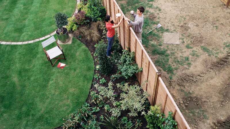 Neighbour drama can occur when it comes to fences (Stock Image) (Image: Getty Images/Image Source)