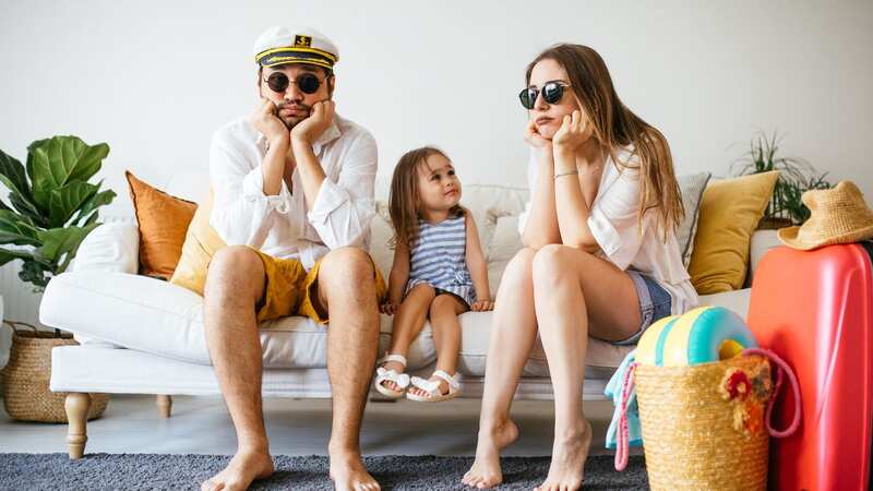 An expert has revealed how to avoid having your holiday ruined by fraudsters (Image: Getty Images)