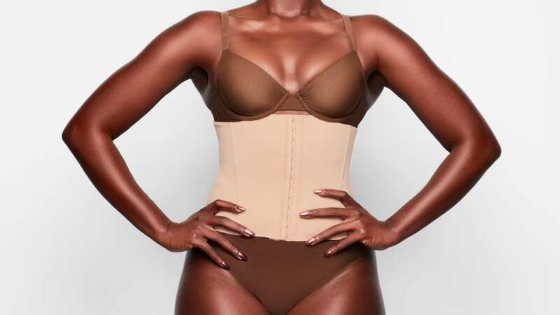 The waist trainer helps hide any unwanted lumps and bumps