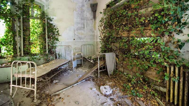 Beds and furniture remain in one of the dormitories in the psychiatric ward (Image: Getty Images)