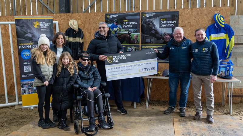 Rob and Lindsey Burrow accept cheque for £7,777