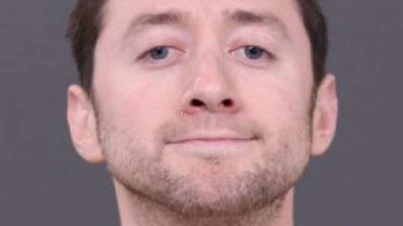 Justin Mohn, 32, appears to be smirking in his mugshot (Image: Bucks County District Attorney