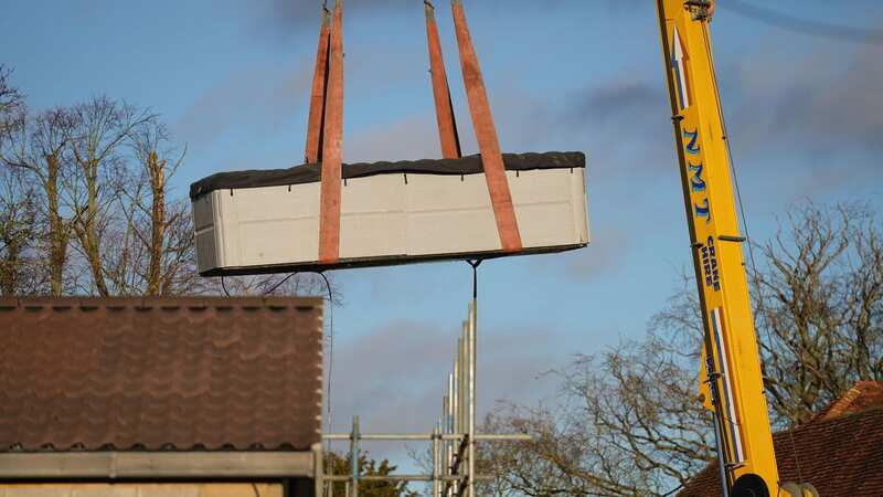 Hot tub craned out of Captain Tom