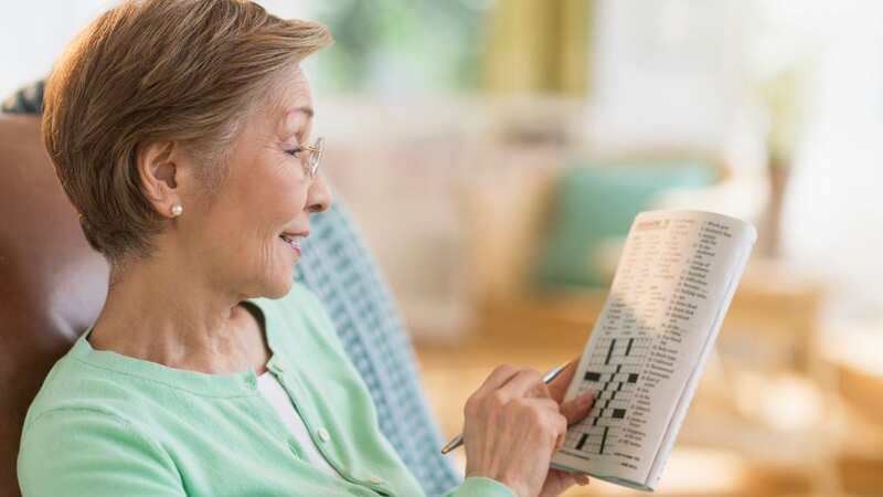 Simple things such as crossword puzzles can reduce dementia risk (Stock Image) (Image: Getty)