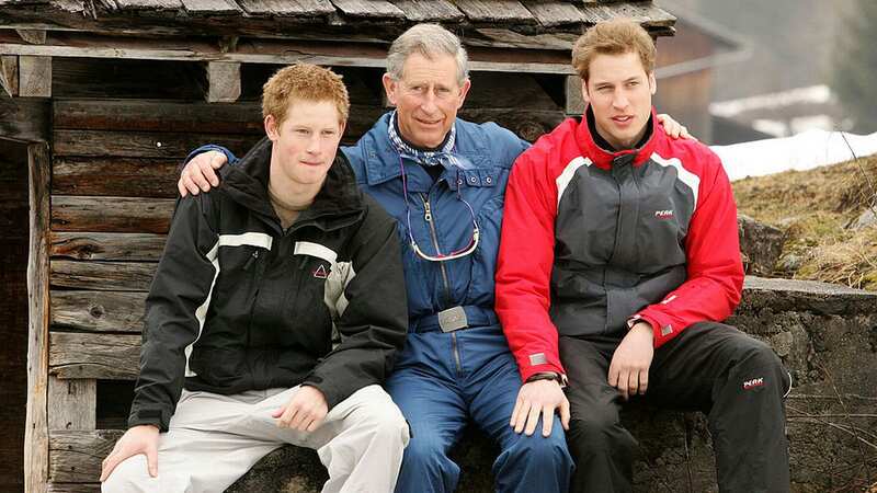 King Charles poses with his sons Prince William (R) and Prince Harry (L) during the Royal Family