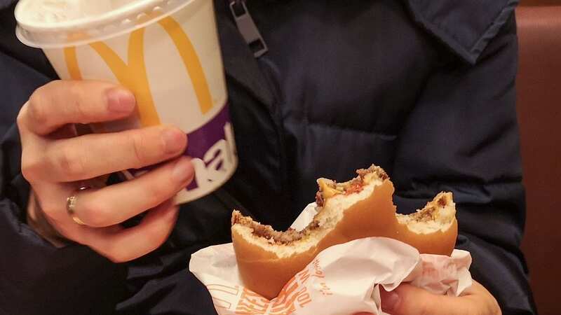She managed to get two burgers, two drinks and chips for just 80p (Image: NurPhoto via Getty Images)