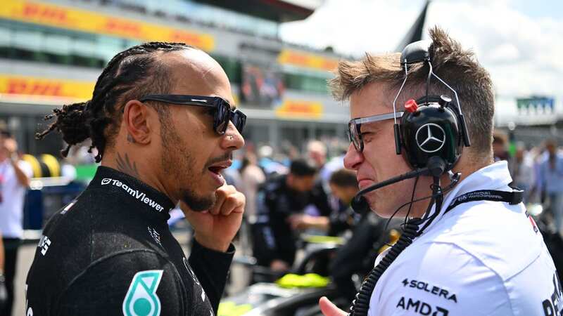 Lewis Hamilton with Mercedes race engineer Peter 