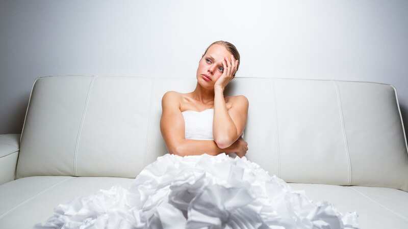 The mum has already taken one of the wedding photos to be edited (stock photo) (Image: Getty Images/iStockphoto)