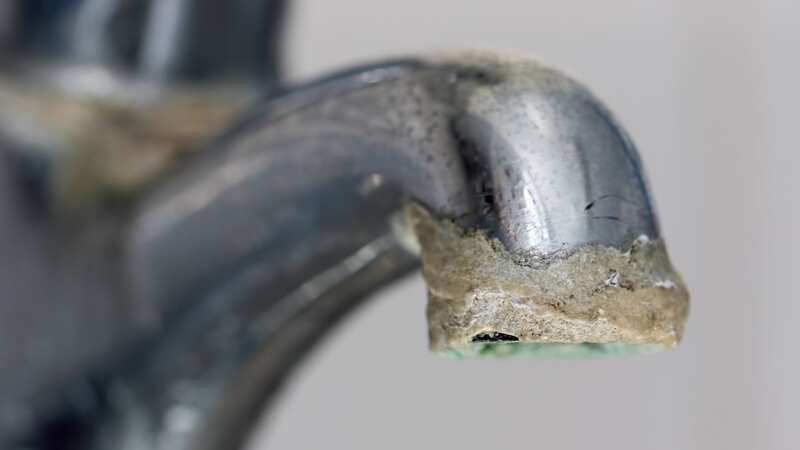 Limescale build-up can stop your taps from working as efficiently (Image: Getty Images/iStockphoto)