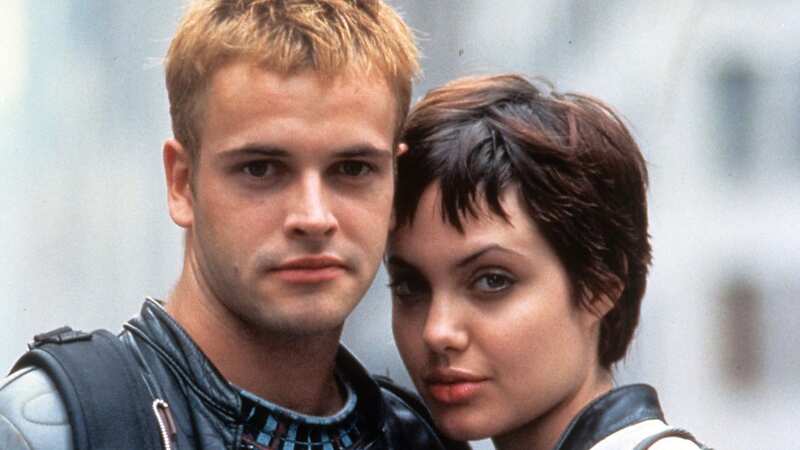 Jonny Lee Miller and Angelina Jolie finalised their divorce back in 2000 (Image: Getty Images)