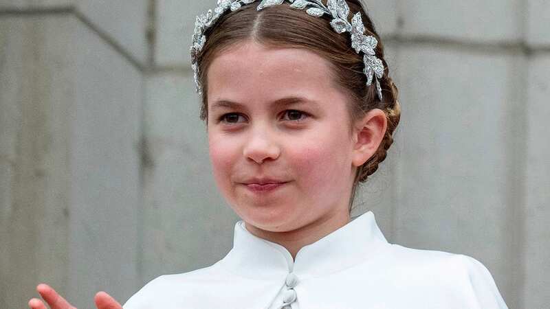 Princess Charlotte of Wales on the balcony of Buckingham Palace during the Coronation of King (Image: UK Press via Getty Images)