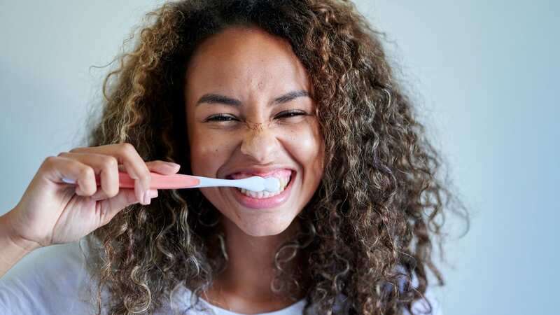A dentist says people are making a common mistake when brushing with teeth (stock photo) (Image: Getty Images/Westend61)