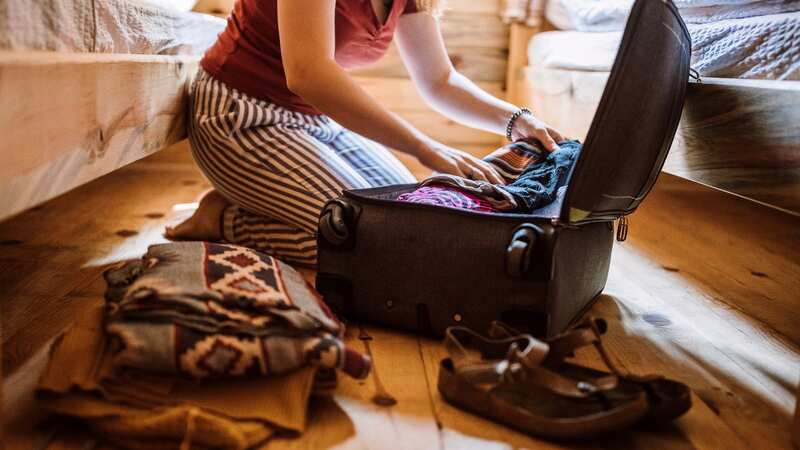 She unpacked his suitcase when he returned home from a 