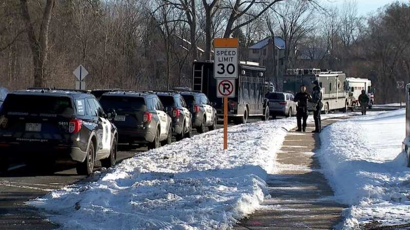 Two police officers and medic shot dead at home after call about weapons
