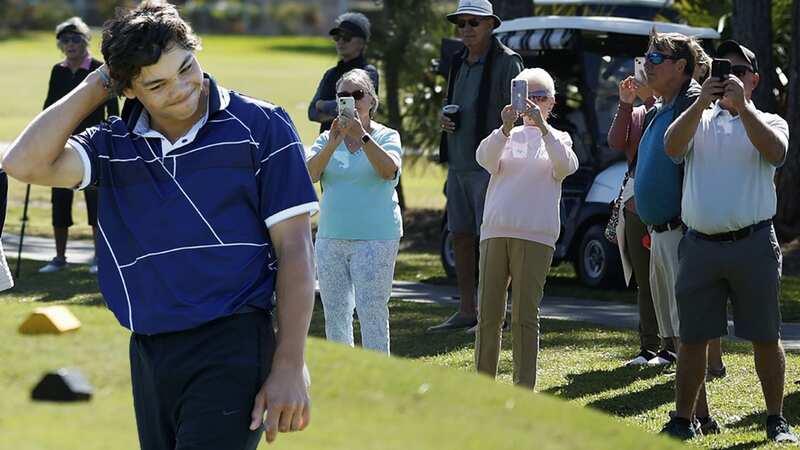 Charlie Woods was left scratching his head at his own play and the conduct of the crowd following him (Image: Getty)
