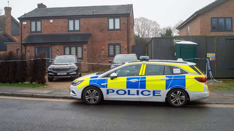 Police at a home in Beaconsfield following the discovery of a woman