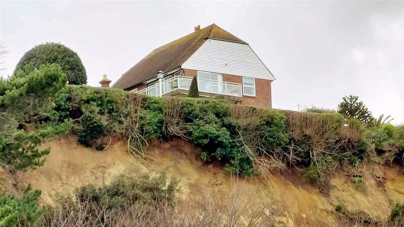 The aftermath of a huge landslide under a clifftop house (Image: Kent Online/SWNS)