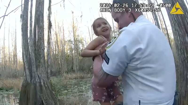 Breathtaking moment police rescue a 5-year-old girl missing in treacherous swamp