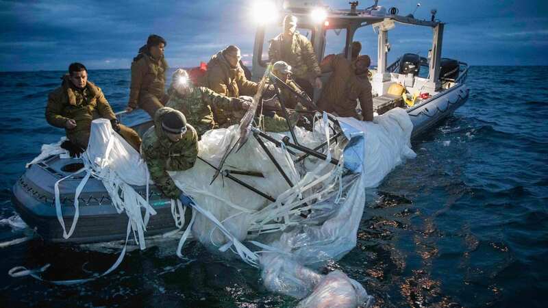 A baffled group of sailors came across the balloon off the coast of Alaska (Image: US NAVY/AFP via Getty Images)