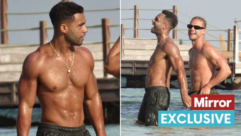 Lucien Laviscount with footballer pal Rurik Gislason on a beach in Tulum
