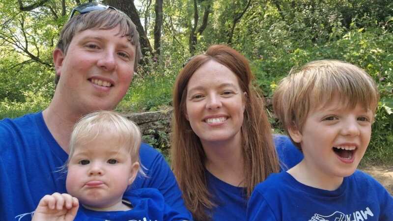 Kelly and Mike are pictured with Oscar and their daughter (Image: nhs)