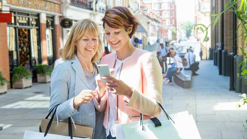 You could be treating Mum to a shopping spree with a Wowcher voucher (Image: Getty)