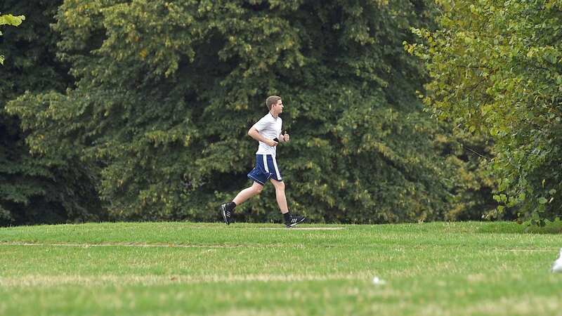A man jogs through a park [file image] (Image: PA Archive/PA Images)
