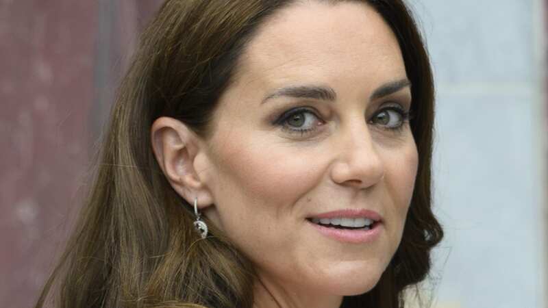 Fans think they know why Kate was forced to make some changes to the photograph (Image: Tim Rooke/REX/Shutterstock)