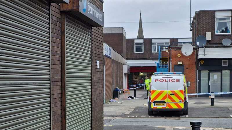 Three rushed to hospital with knifeman on-the-run as police descend on town