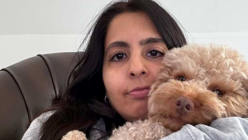 Devanshi with pet pooch Harry (Image: Devanshi Ruperal/SWNS)