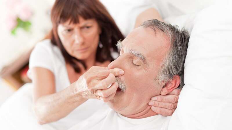 Snoring is the top way Brits say their partner interrupts their sleep (Image: Getty Images)