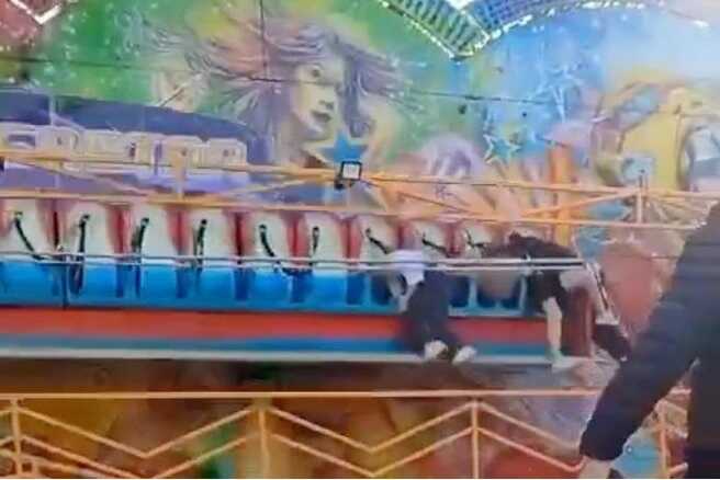 Children cling to life as safety bar detaches from fairground ride