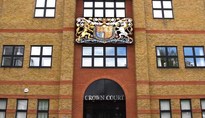 Footballer raped sleeping woman and sent naked photos to team