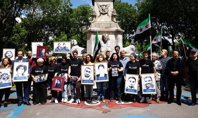 A French court finds three Syrian officials guilty of crimes against humanity