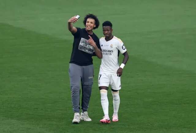 Champions League final interrupted by pitch invaders after less than a minute