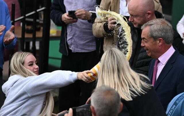 Nigel Farage gets doused in milkshake outside Wetherspoons