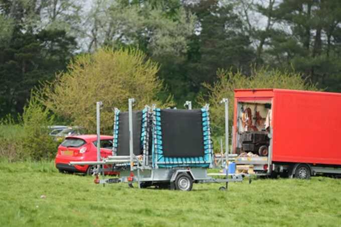 Man suffers electric shock as bungee ride hits power line at village fair