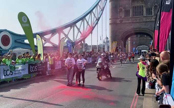 Protesters scatter paint on Tower Bridge during London Marathon and are detained